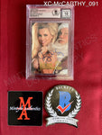 XC-McCARTHY_091 - 1998 Playboy Best Of Jenny McCarthy Sexy Santa #S9 Jenny McCarthy (Auto Grade 10) Trading Card (Slabbed) Autographed By Jenny McCarthy