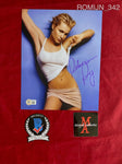 ROMIJN_342 - 8x10 Photo Autographed By Rebecca Romijn